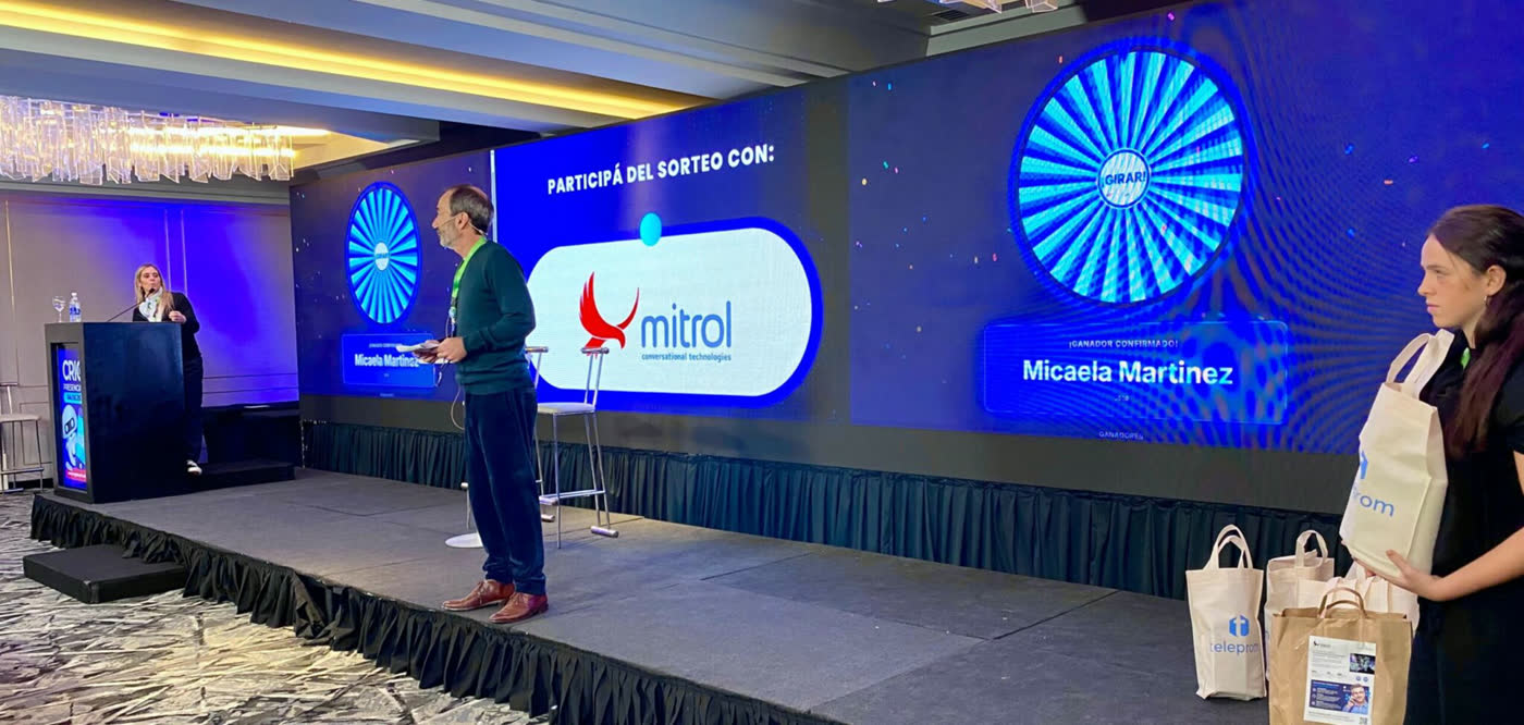Escenario del sorteo de cierre del CRIC 2026 con la marca Mitrol en pantalla